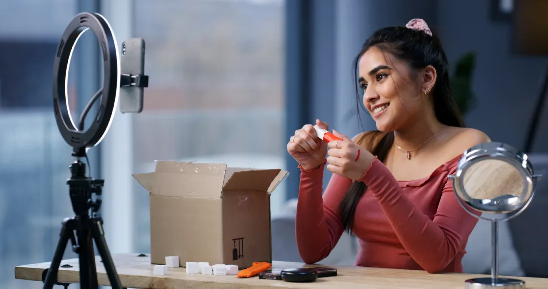 Person unboxing a product seeding package for ambassador program
